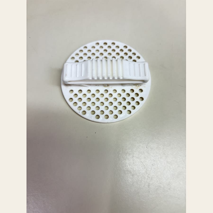 Colleen's round can strainer used for tuna and chicken